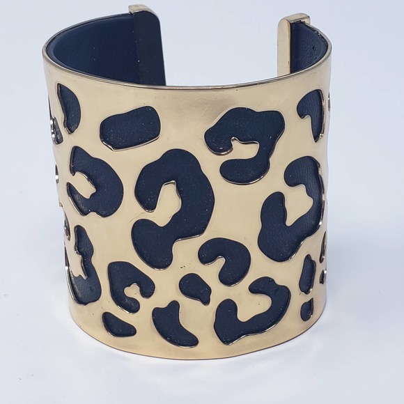 BCBGMaxAzria Jewelry - BCBGMaxazria Gold Tone Black Wide Cuff Bracelet